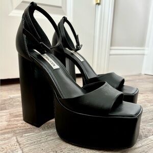 SOLD Steve Madden black leather platform heels